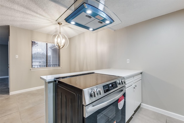 kitchen with light tile patterned floors, hanging light fixtures, white cabinets, stainless steel range with electric cooktop, and kitchen peninsula