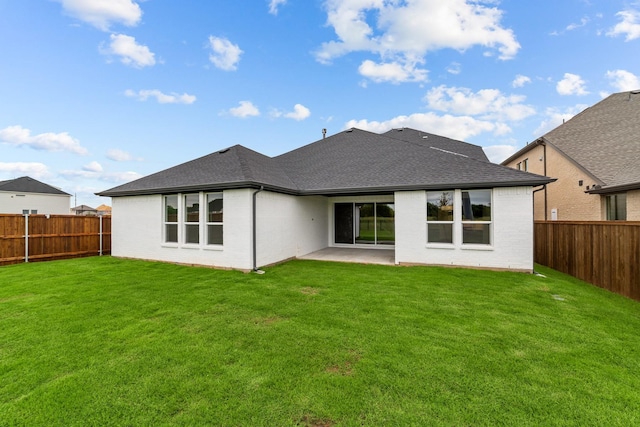 11529 Wulstone Rd, Fort Worth, TX 76052 - back of house featuring brick siding, a patio, and roof with shingles