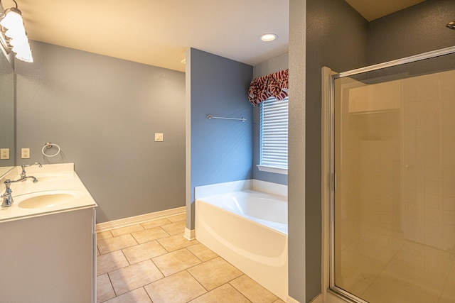 19482 Ruggles Ct, Flint, TX 75762 - full bath featuring tile patterned flooring, a shower stall, a bath, double vanity, and recessed lighting
