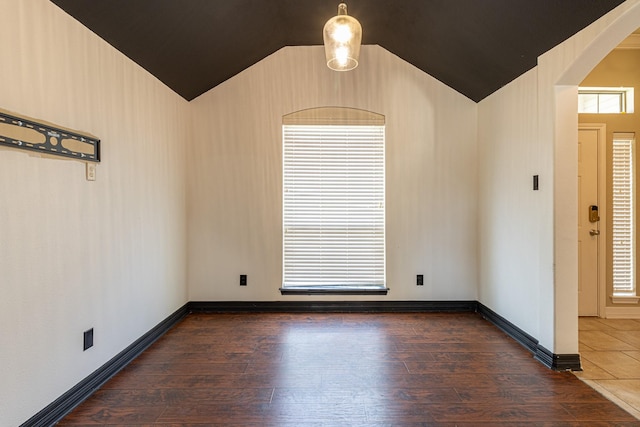 19482 Ruggles Ct, Flint, TX 75762 - spare room with vaulted ceiling, hardwood / wood-style floors, and baseboards