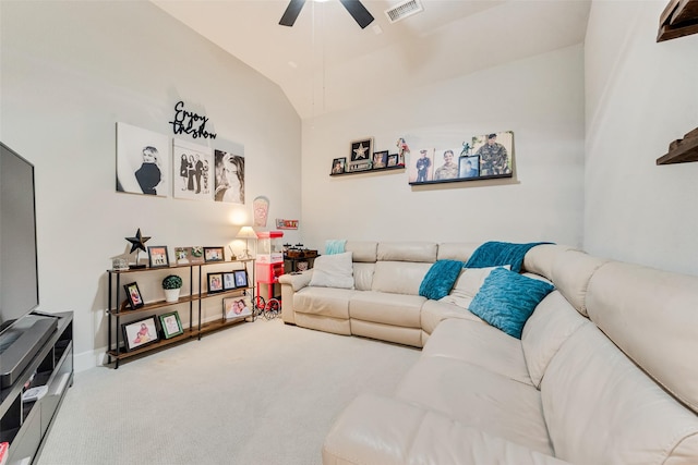 carpeted living room with vaulted ceiling, visible vents, and a ceiling fan