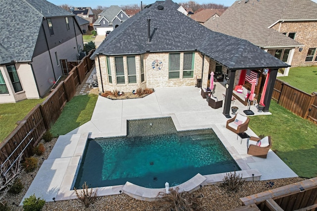 1845 Leo Dr, Van Alstyne, TX 75495 - back of house featuring roof with shingles, brick siding, a patio area, and an outdoor living space