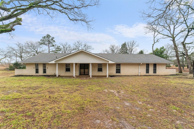 view of front of home with a front lawn