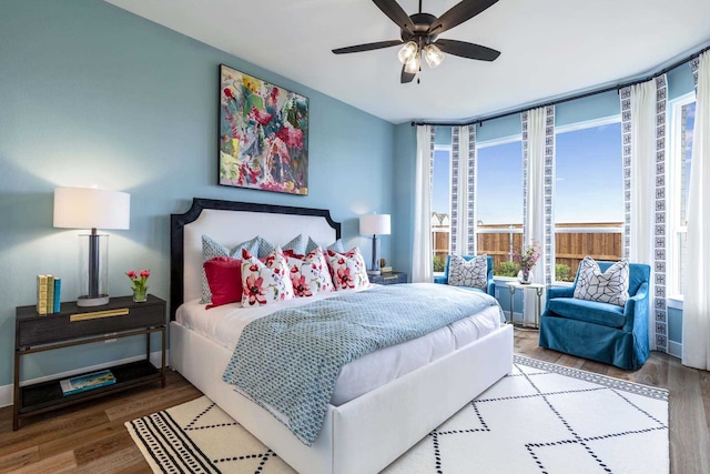 bedroom featuring hardwood / wood-style flooring and ceiling fan