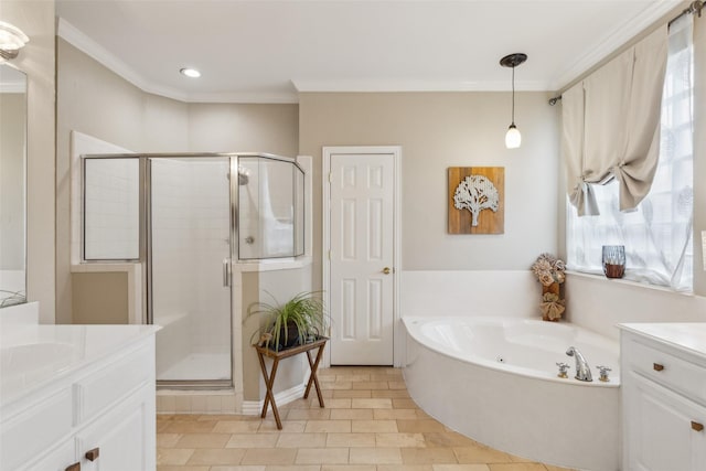 full bath featuring a stall shower, ornamental molding, a garden tub, and vanity