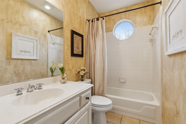 bathroom featuring tile patterned flooring, shower / tub combo with curtain, vanity, and toilet