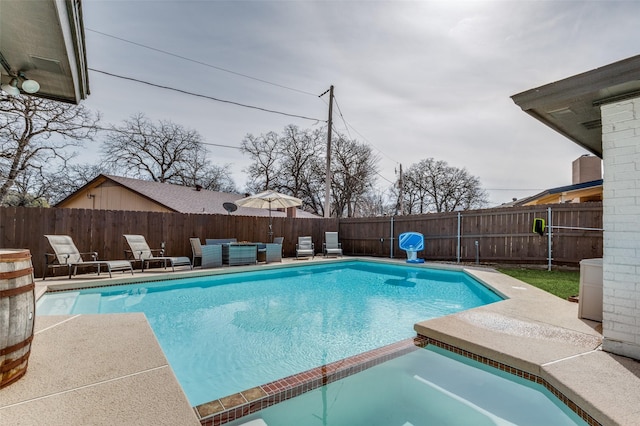 view of swimming pool featuring a patio