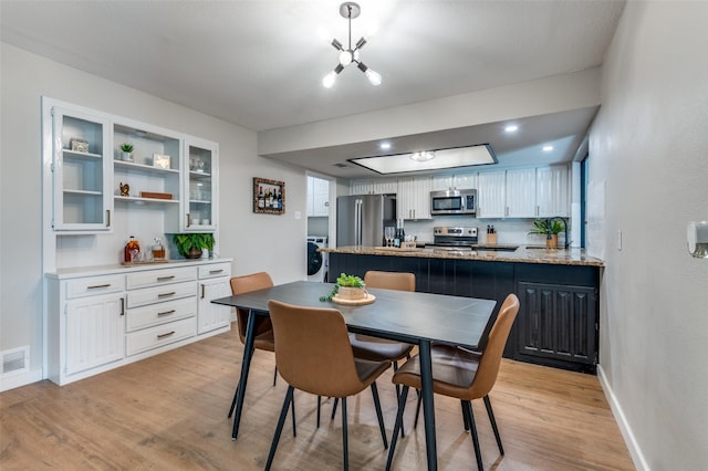 dining area featuring light hardwood / wood-style floors