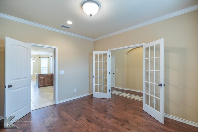 158 Stardust Trl, Tuscola, TX 79562 - spare room with french doors, ornamental molding, wood finished floors, and baseboards