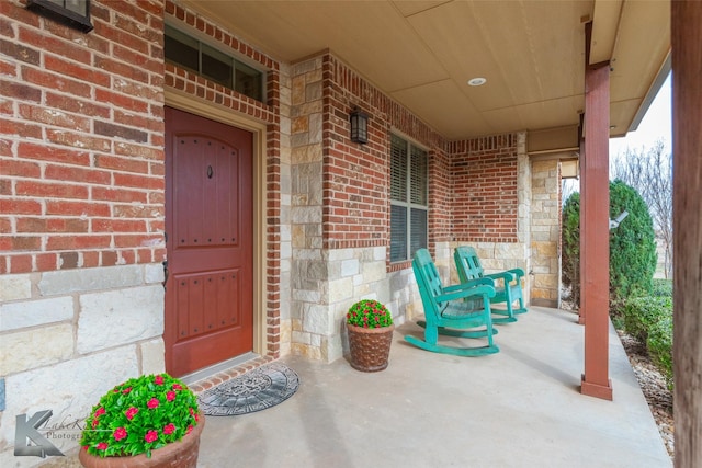 property entrance featuring a porch