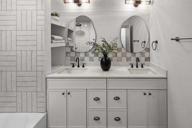 bathroom with vanity and backsplash