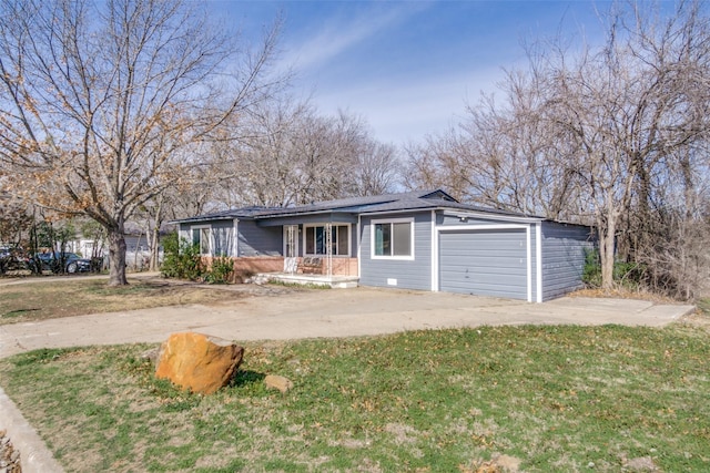 single story home featuring a porch, a garage, and a front yard