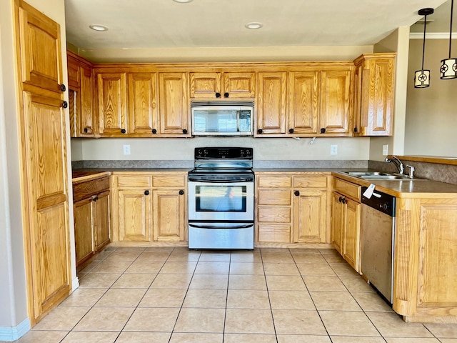 813 El Campo Dr, Rio Vista, TX 76093 - kitchen with hanging light fixtures, light tile patterned flooring, sink, and appliances with stainless steel finishes