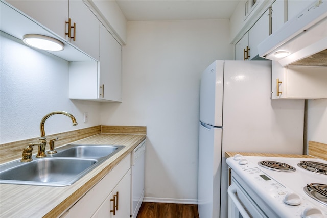 kitchen featuring white cabinetry, white appliances, dark hardwood / wood-style flooring, and sink