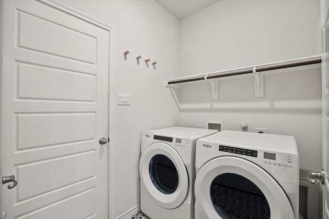 washroom with washer and clothes dryer