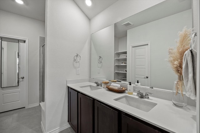 126 Condor Pass, Caddo Mills, TX 75135 - bathroom featuring double vanity, a shower, tile patterned floors, and baseboards