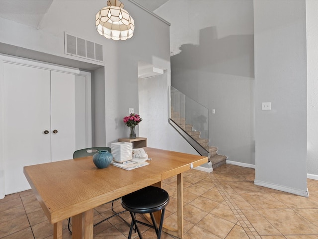 dining room with light tile patterned floors