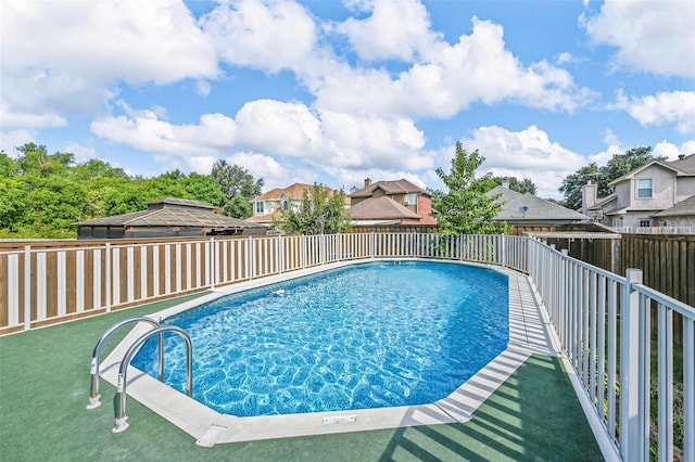 2305 Buckeye Dr, Mesquite, TX 75181 - view of pool with a fenced backyard and a residential view