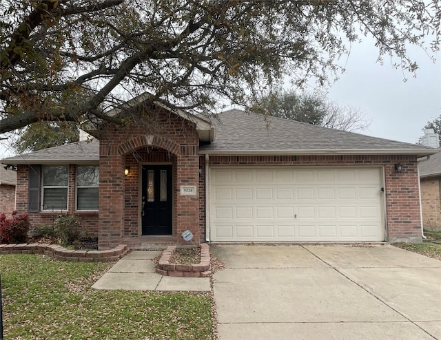 single story home featuring a garage