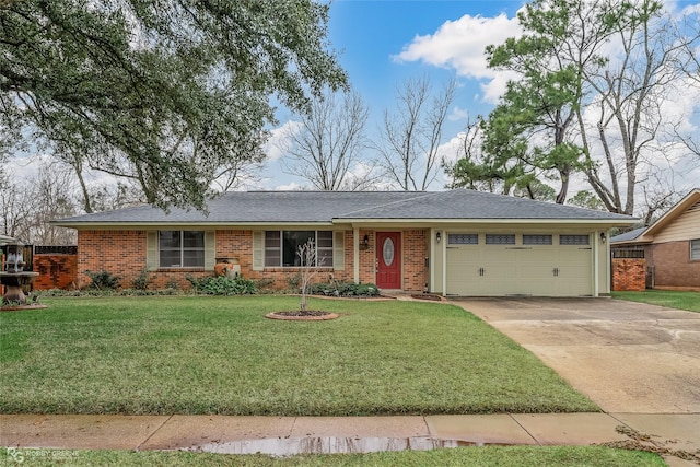 ranch-style home featuring a garage and a front lawn