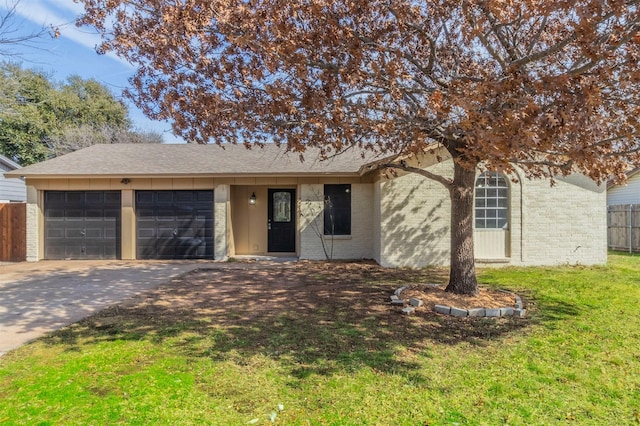 ranch-style house with a garage and a front lawn