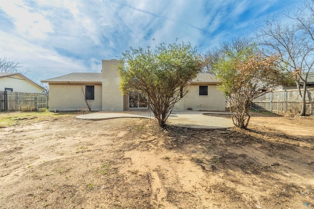 rear view of property with a patio