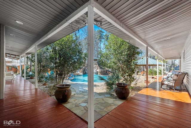 deck featuring an outdoor pool