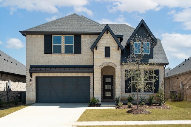 view of front of house with brick siding, a shingled roof, a garage, and concrete driveway
