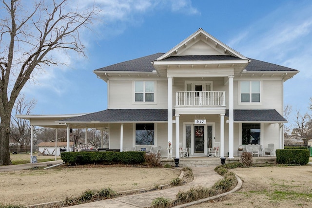 view of front of home featuring a porch and a balcony