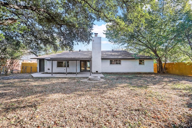 rear view of house with a patio area