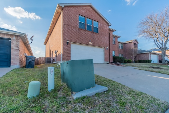 view of side of property with brick siding, concrete driveway, a lawn, central AC unit, and a garage