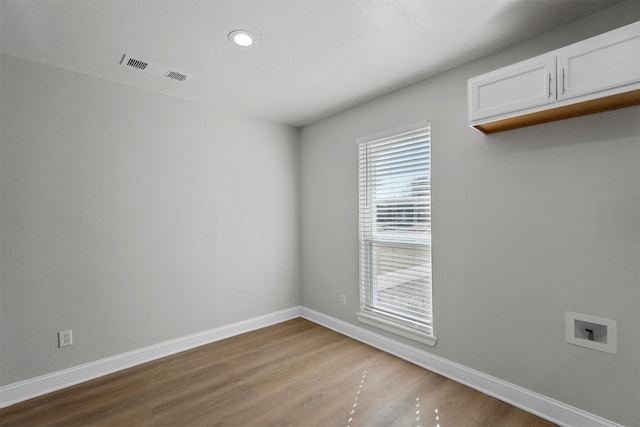 empty room with light wood-type flooring