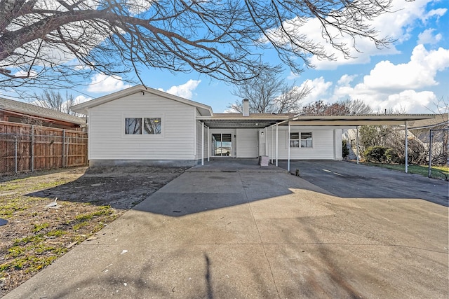 view of front of property with a carport