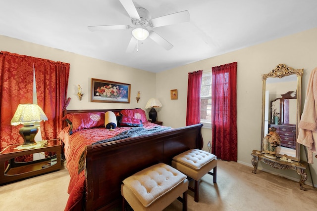 bedroom with light colored carpet and ceiling fan