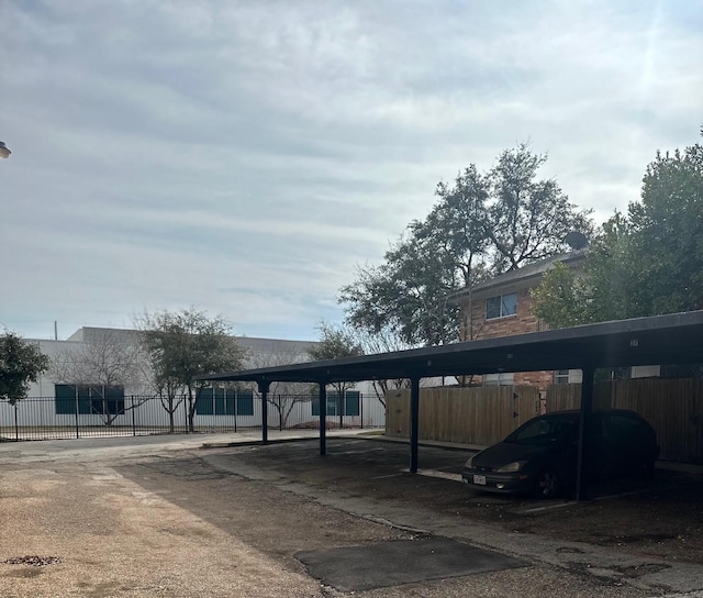 view of car parking with a carport