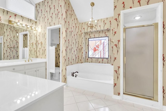 full bathroom featuring toilet, separate shower and tub, vanity, a notable chandelier, and tile patterned flooring