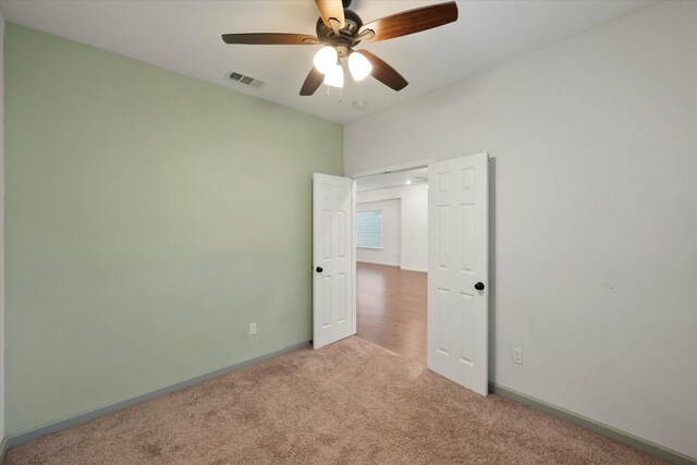223 S Oak Cliff Blvd, Dallas, TX 75208 - kitchen with decorative backsplash, appliances with stainless steel finishes, dark wood finished floors, a sink, and glass insert cabinets