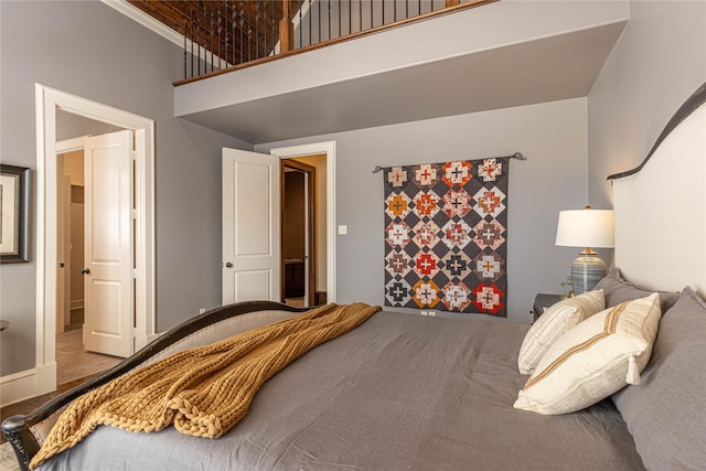 bedroom featuring a high ceiling