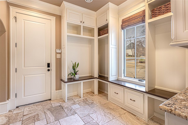 mudroom with built in desk