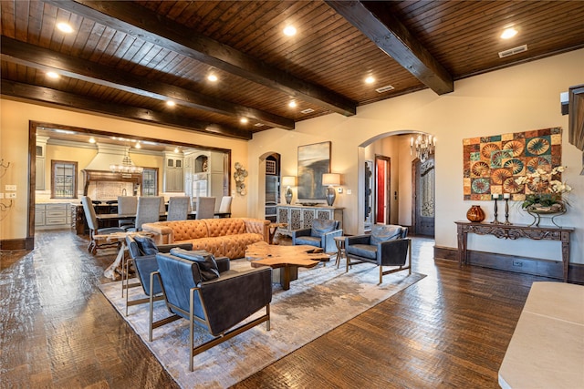 living room with beamed ceiling, a notable chandelier, wooden ceiling, and dark hardwood / wood-style flooring