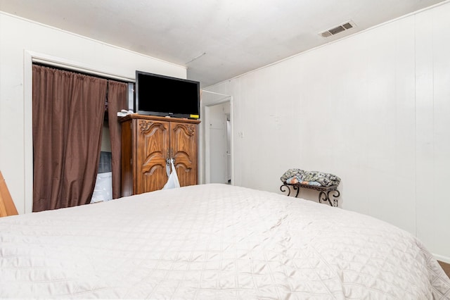 bedroom with visible vents