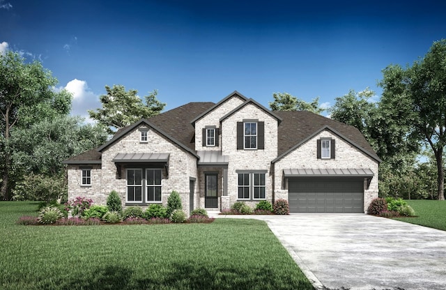 view of front of home featuring a garage and a front lawn