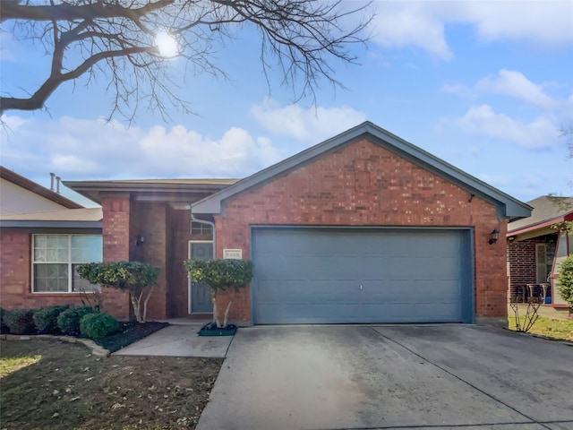 single story home featuring a garage