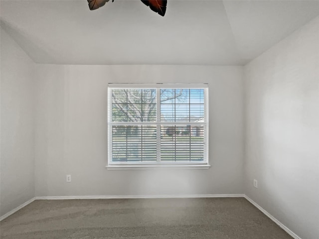 spare room with carpet flooring and ceiling fan