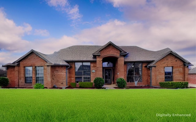 view of front of house with a yard