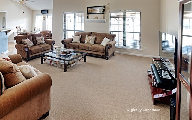 carpeted living room with vaulted ceiling and ceiling fan