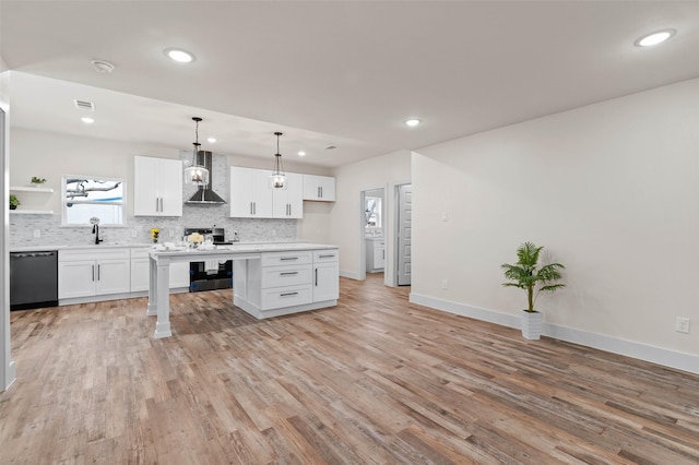 kitchen with open shelves, tasteful backsplash, wall chimney exhaust hood, white cabinets, and dishwasher