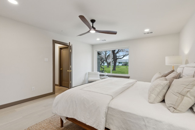 bedroom featuring ceiling fan and light hardwood / wood-style flooring