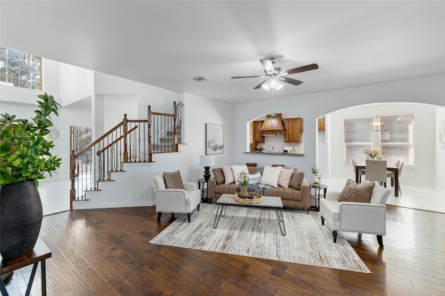 living room with a healthy amount of sunlight, hardwood / wood-style floors, and ceiling fan