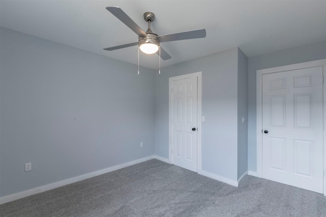 unfurnished bedroom with carpet and ceiling fan